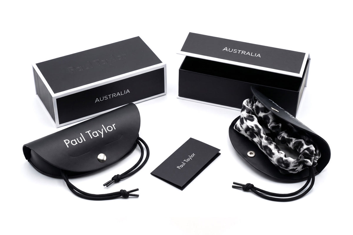 Leather exterior Spectacle Case with a Nylon draw string stud button closure, Micro Fibre Lens Cleaning Cloth and Gift Box